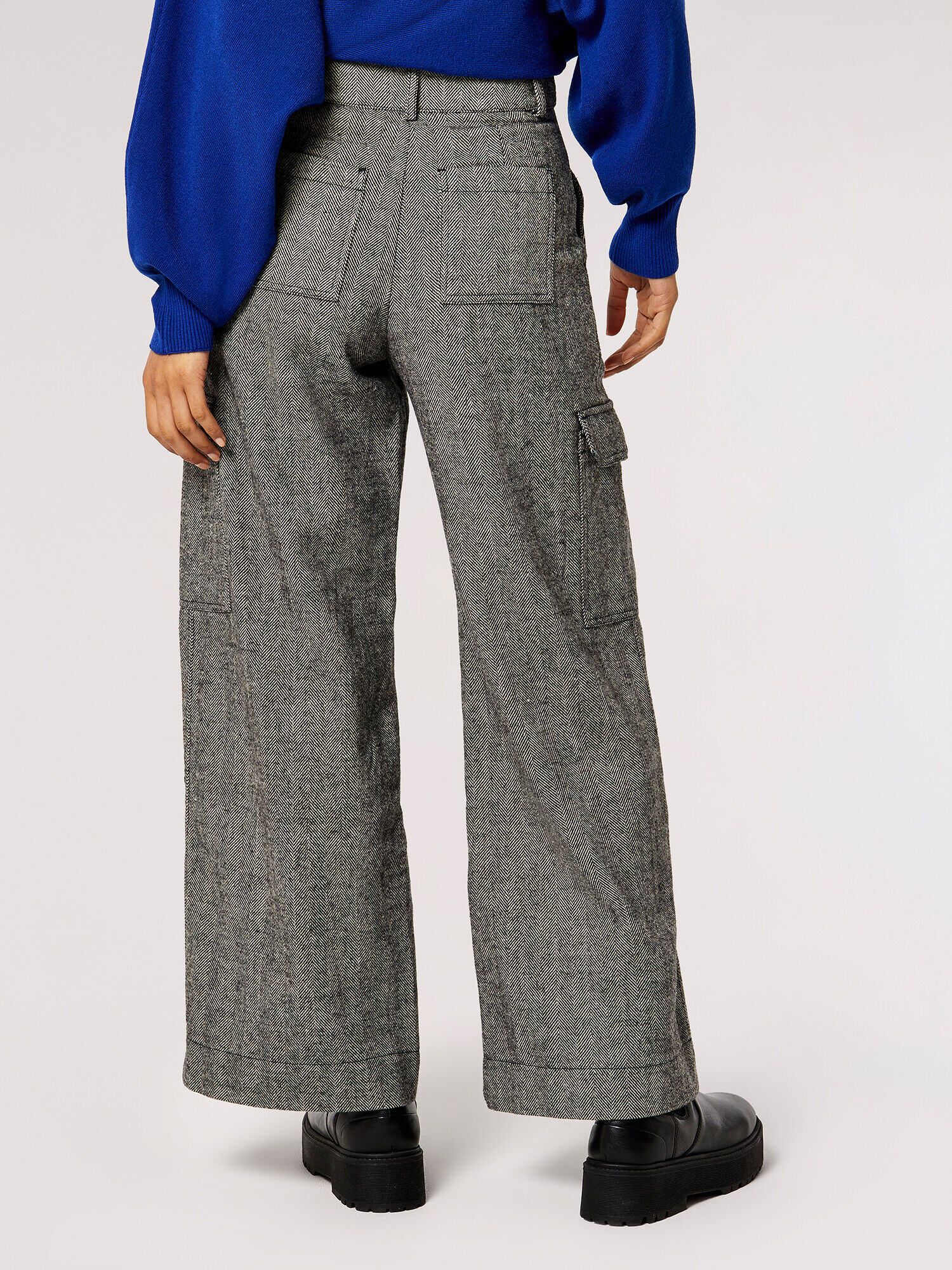 COS - Made from wool, these wide-leg pants feature three... | Facebook