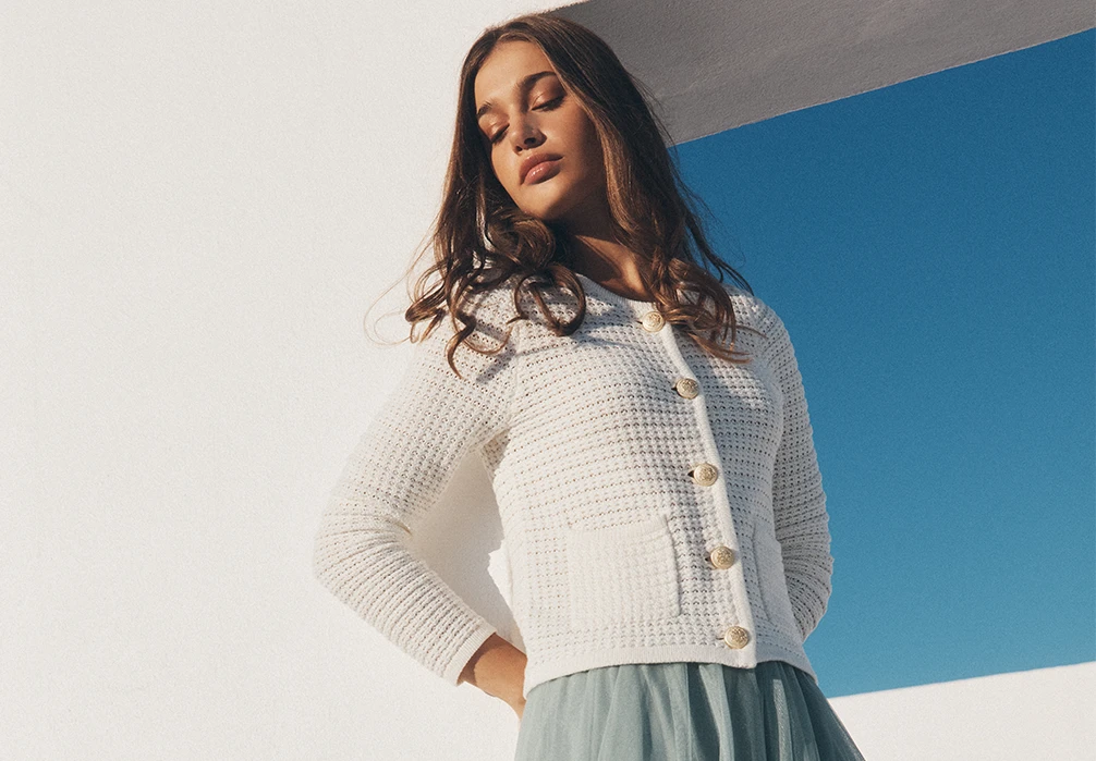 From super-soft jumpers in relaxed silhouettes to form-fitting bodycon dresses, tops, and cardigans made for layering, cosy up in classic knitwear designed to take you through the seasons in timeless style.